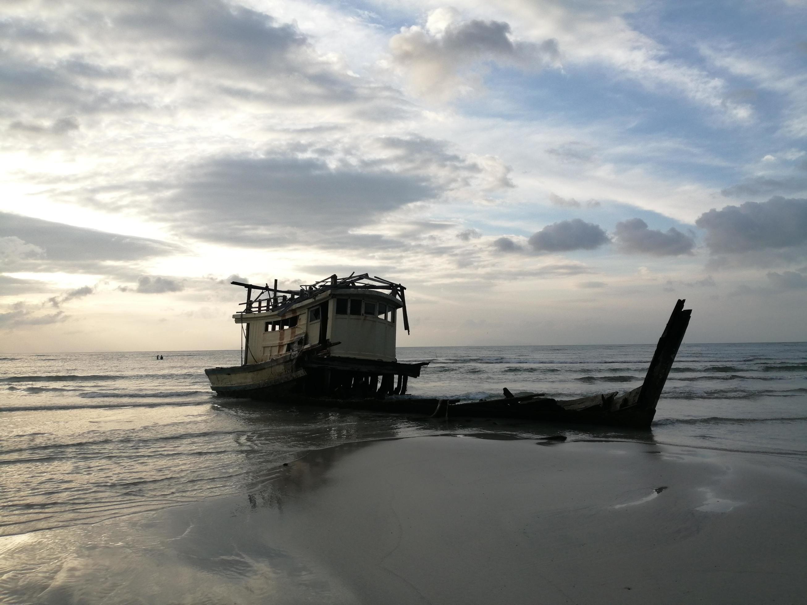 old ship shipwreck sea sky evening nature Stock Free