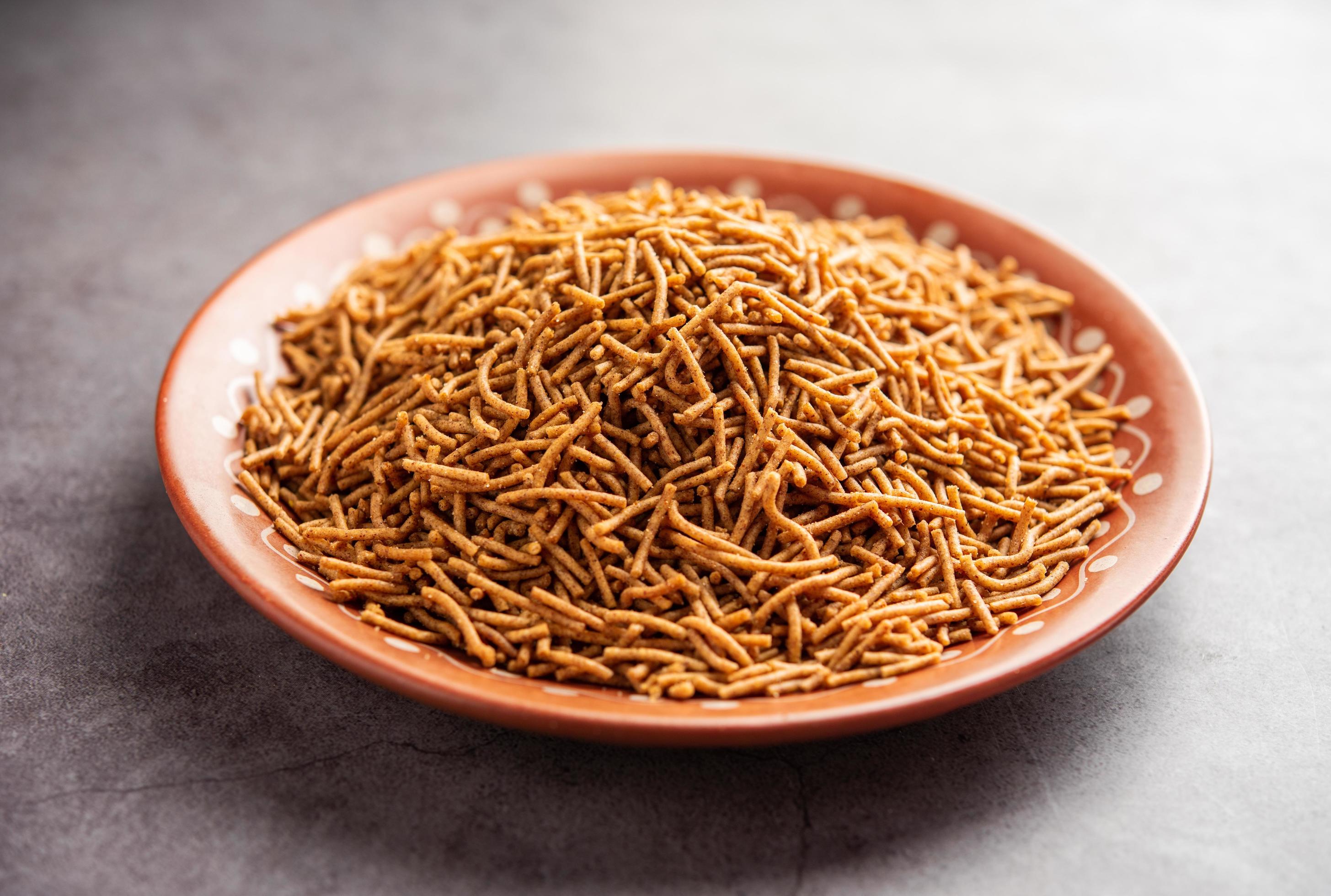 Nachni or Ragi Sev is a delicious crispy noodle made from finger millets, healthy Indian food Stock Free