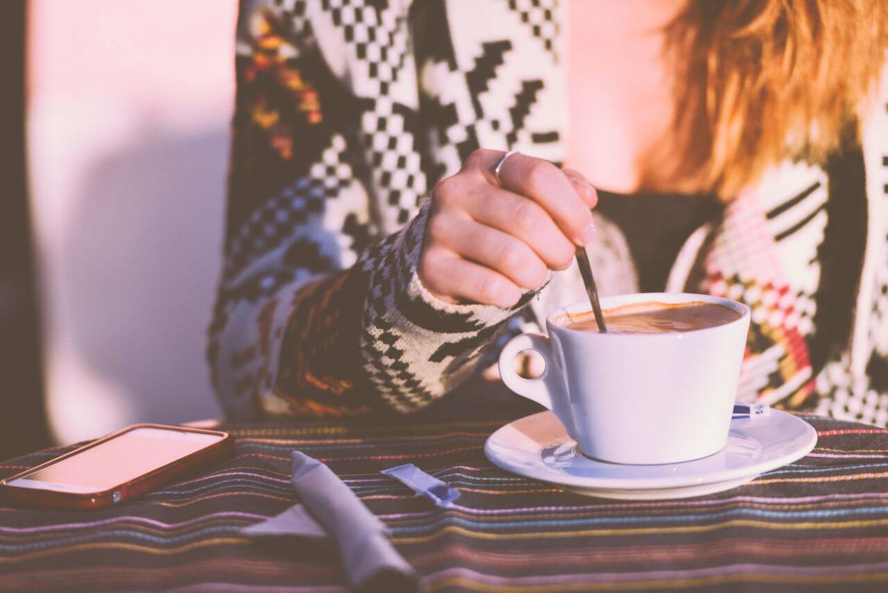 Woman Stirring Coffee Stock Free