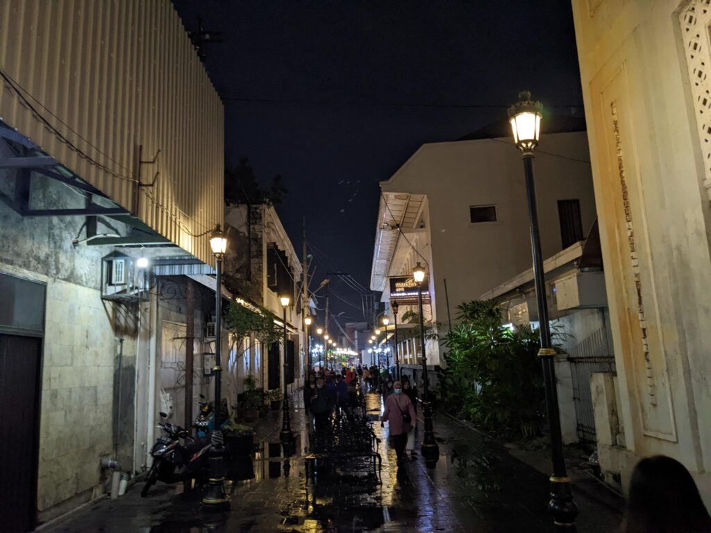 Night walker on the light of downtown city. The photo is suitable to use for city landscape background and night light. Stock Free