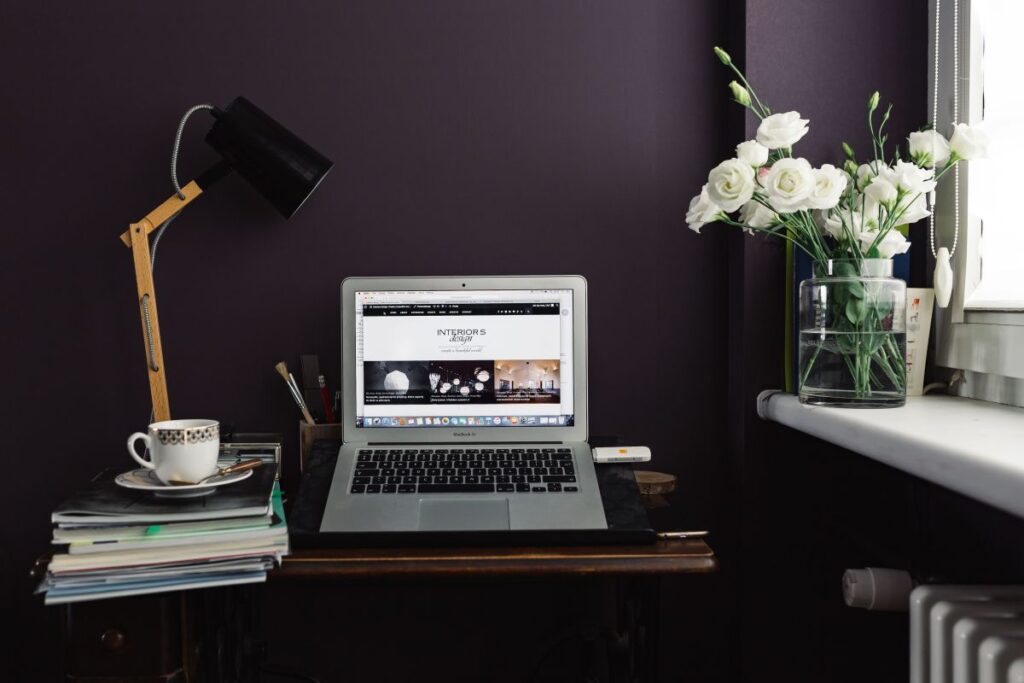 Contemporary home office idea with dark walls Stock Free