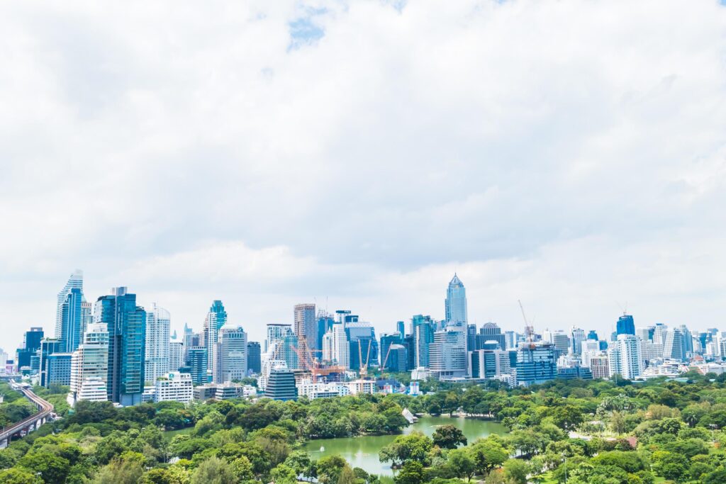 Beautiful office building tower and architecture in bangkok city Stock Free