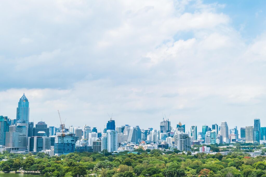 Beautiful office building tower and architecture in bangkok city Stock Free