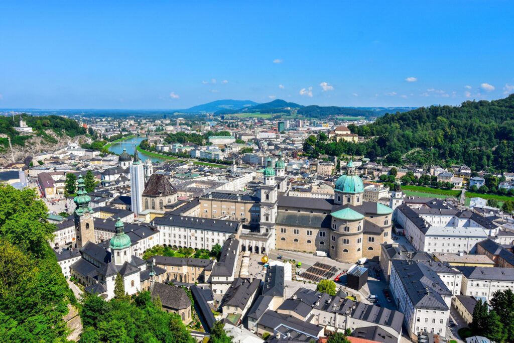 Beautiful panoramic view in summer season of cityscape at historic city of Salzburg with iconic Salzburg Cathedral Stock Free