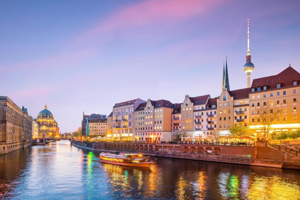 Berlin skyline with Spree river at sunset Stock Free