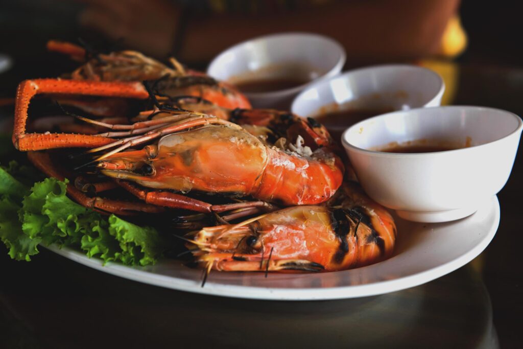 Burnt shrimp sea food on dish Stock Free