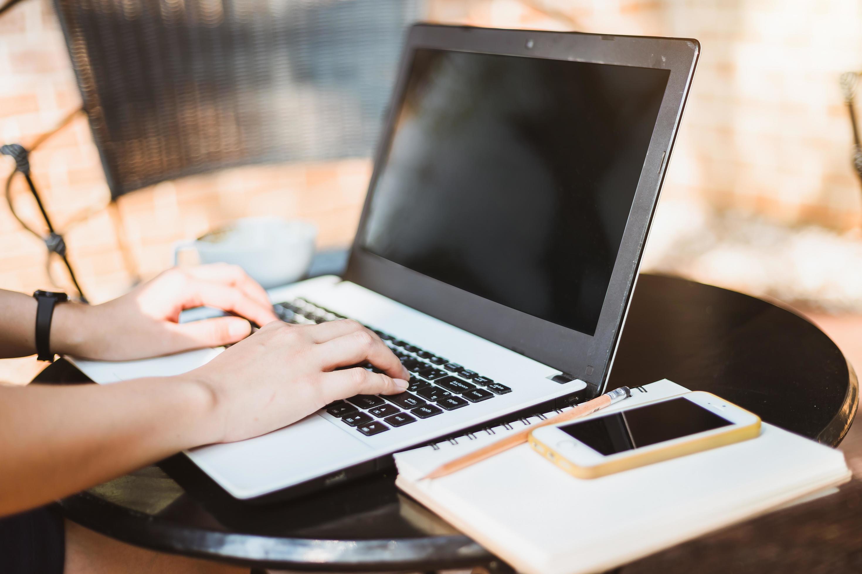 Business Asian woman working with laptop computer on office outdoor. Stock Free