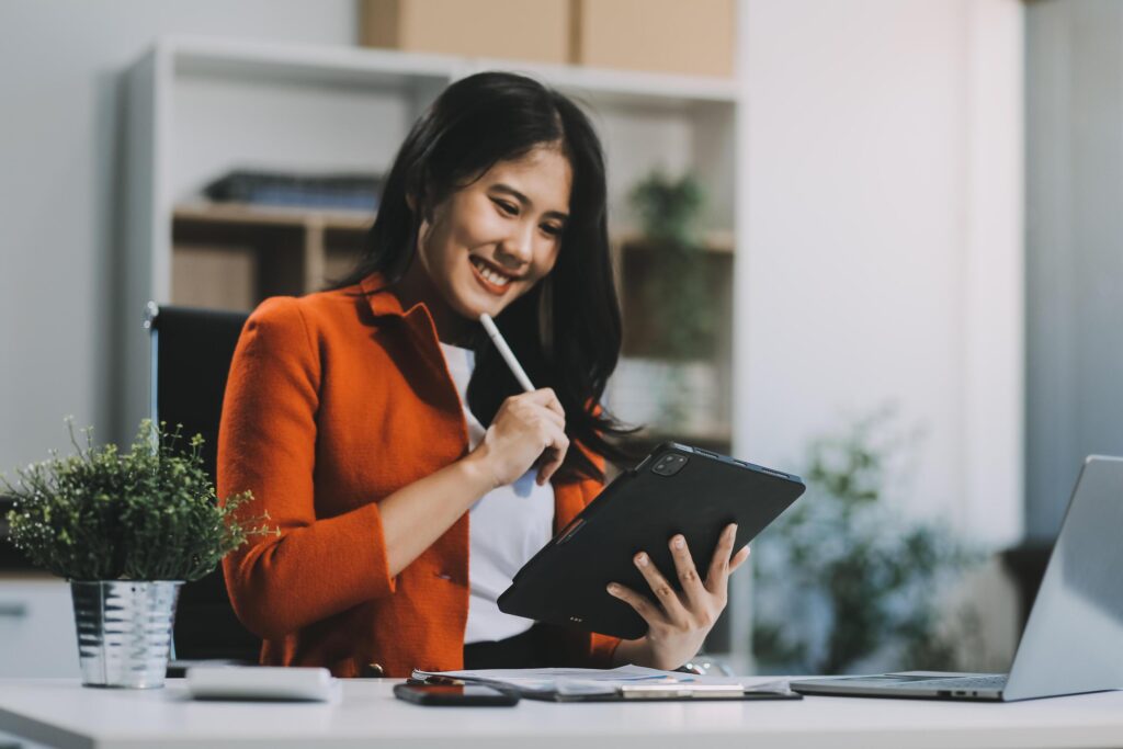 Happy executive sales business woman cheering excited in celebration after good news. achieving goals, success concept Stock Free