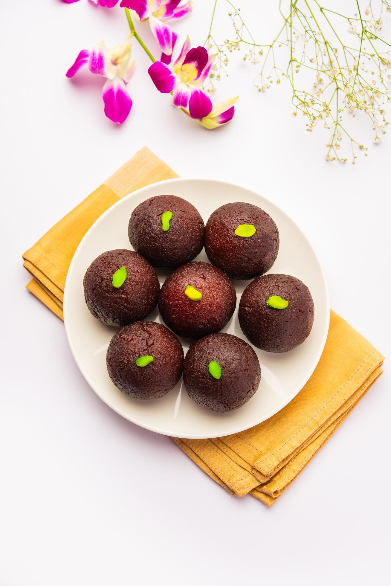 Indian Sweet Food Sweet Black Gulab Jamun Also Known as Kala Jamun, Black Jamun or Dry Kala Jam Stock Free