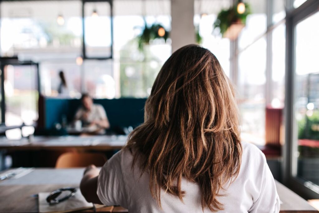 Young woman working in a cafe Stock Free