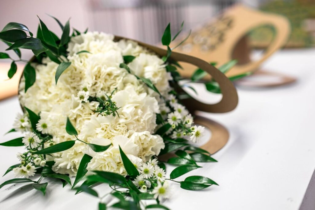 Beautiful bouquet of white flowers on a table Stock Free