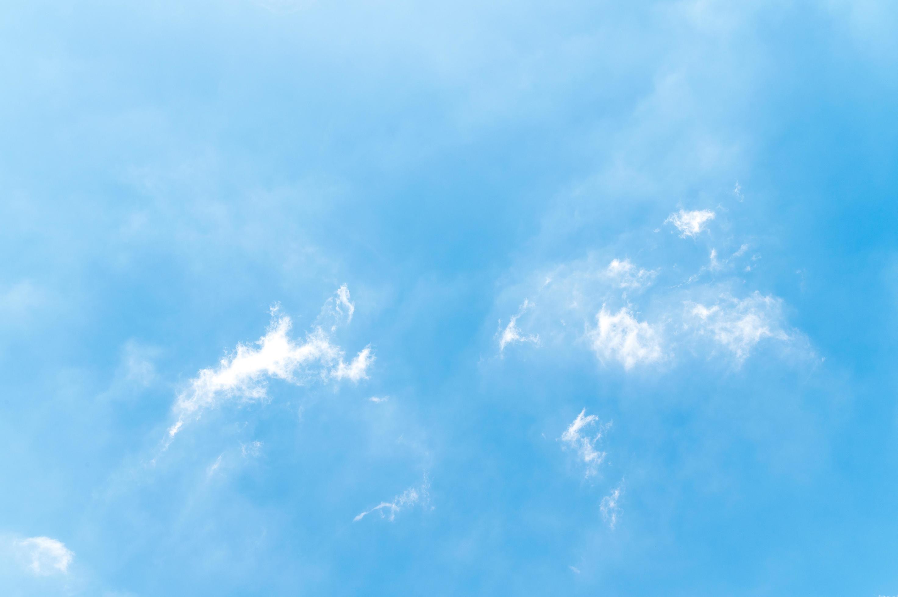 Beautiful white fluffy clouds in blue sky. Nature background from white clouds in sunny day Stock Free