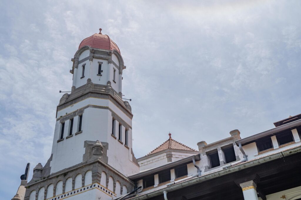 Tower on old mansion of Semarang Central Java with blue sky. The photo is suitable to use for travel destination, holiday poster and travel content media. Stock Free