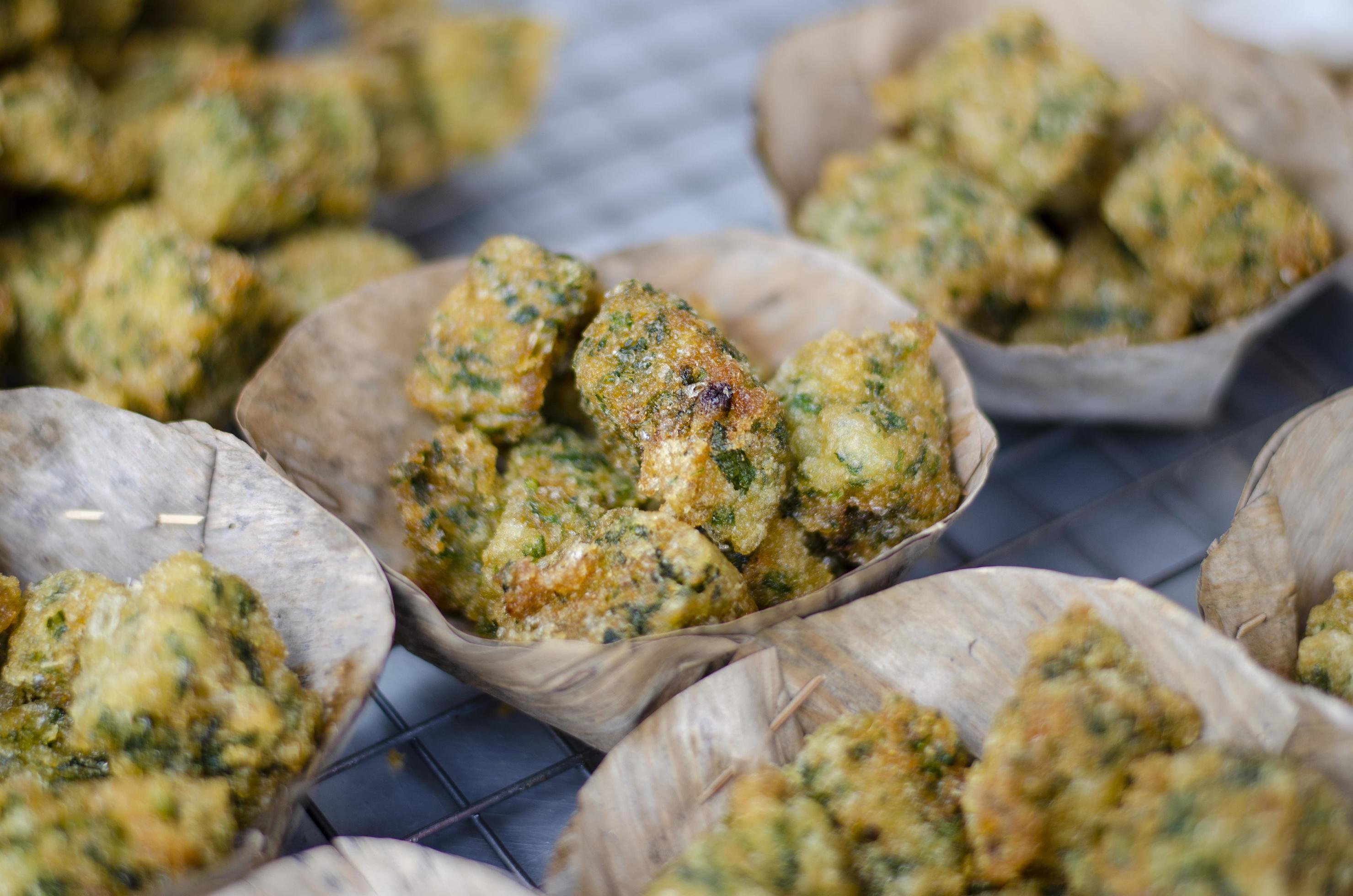 Garlic Chives Cakes on banana leaves, Asian style food Stock Free