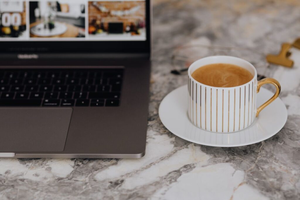 Coffee in a cup on a marble desk Stock Free