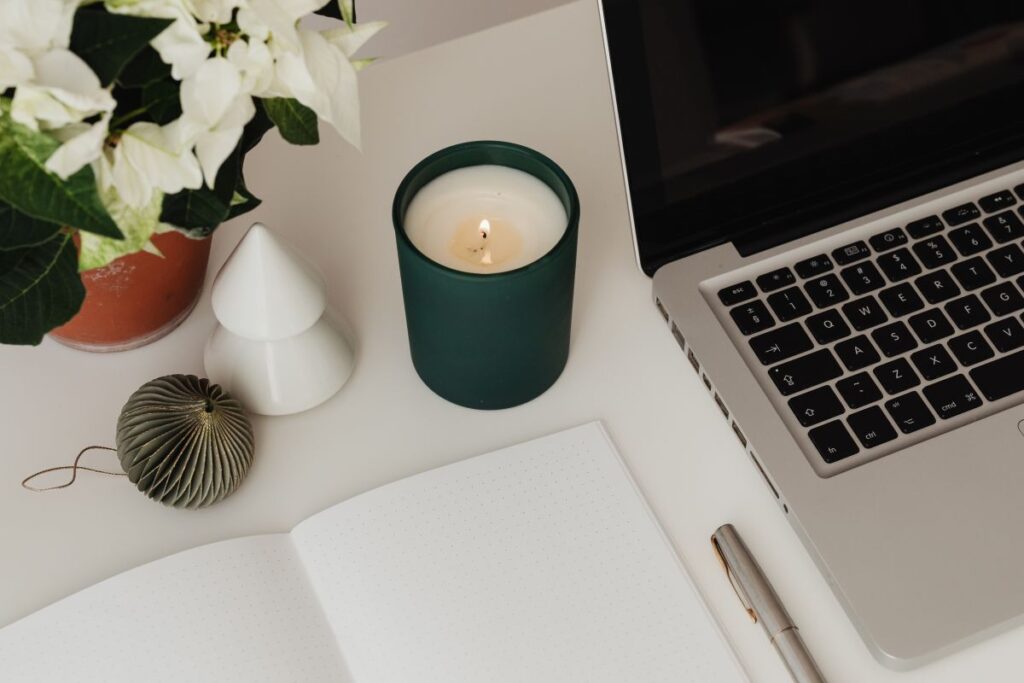 Detail of desk with laptop – supplies – notepad Stock Free