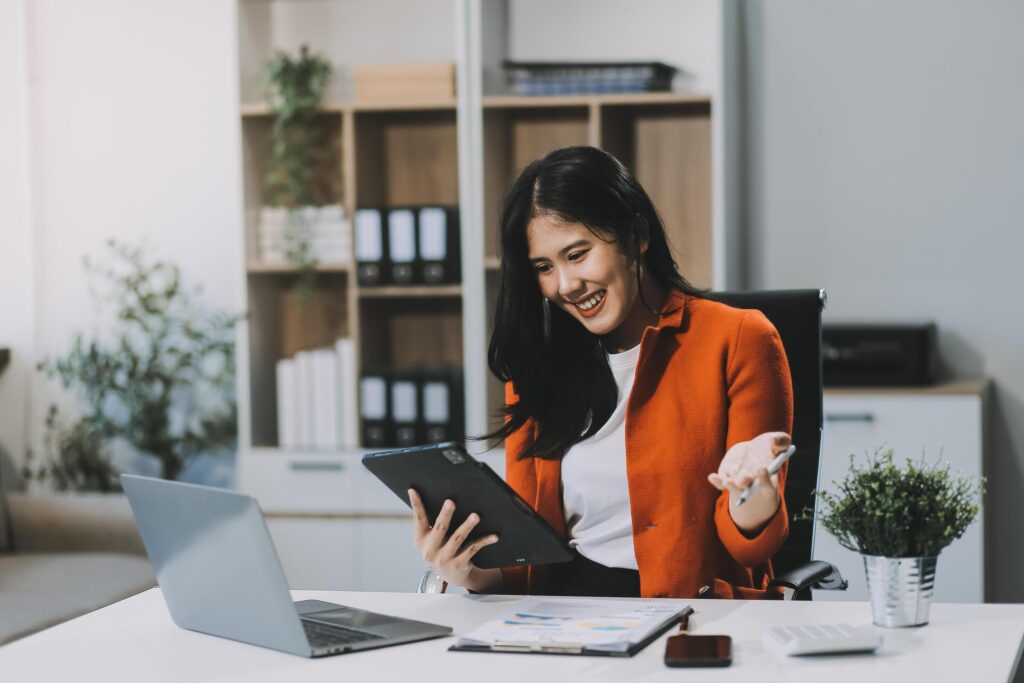 Happy executive sales business woman cheering excited in celebration after good news. achieving goals, success concept Stock Free