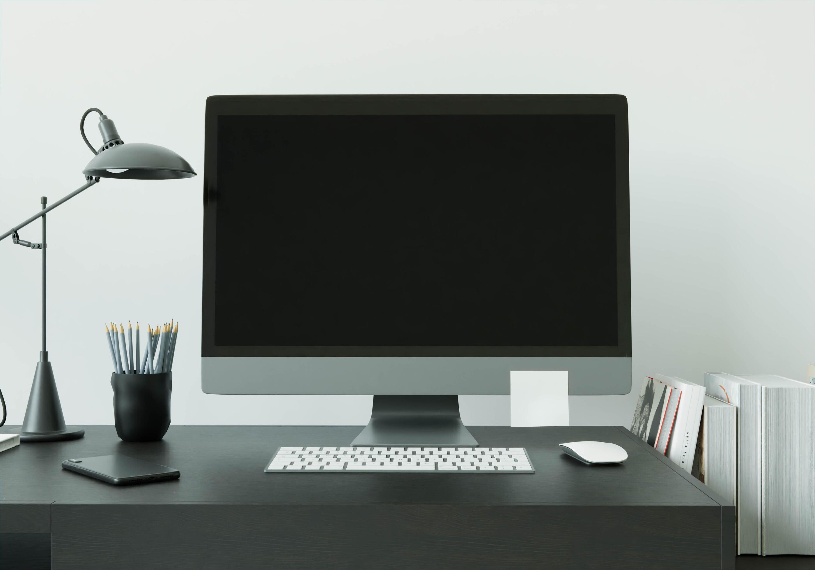 A working room with a computer placed on the table Stock Free