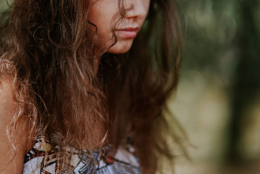 Woman in a dress with a camera Stock Free