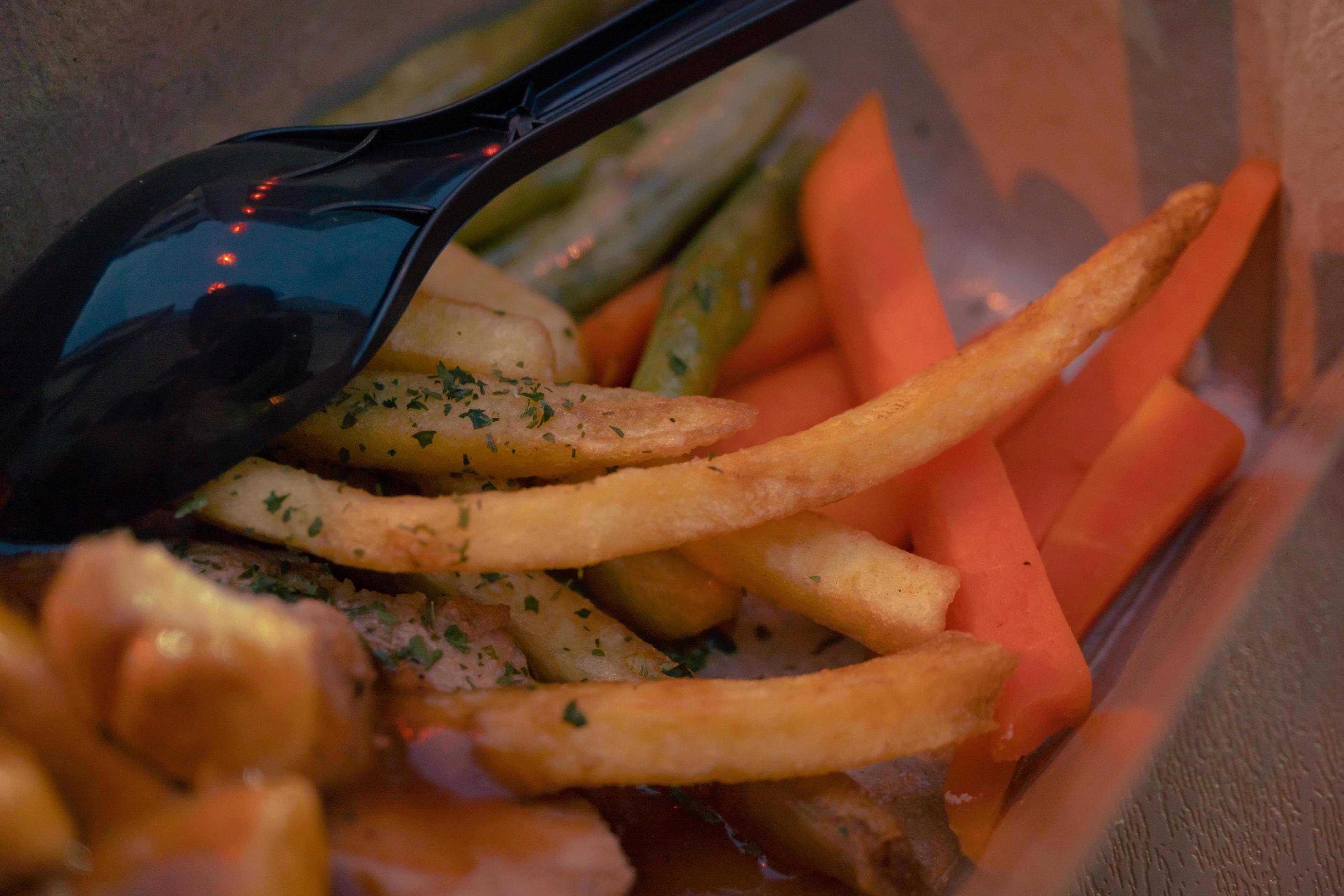 Fried chicken steak with fired fries bean and barbeque black paper sauce. The photo is suitable to use for food background, poster and food content media. Stock Free