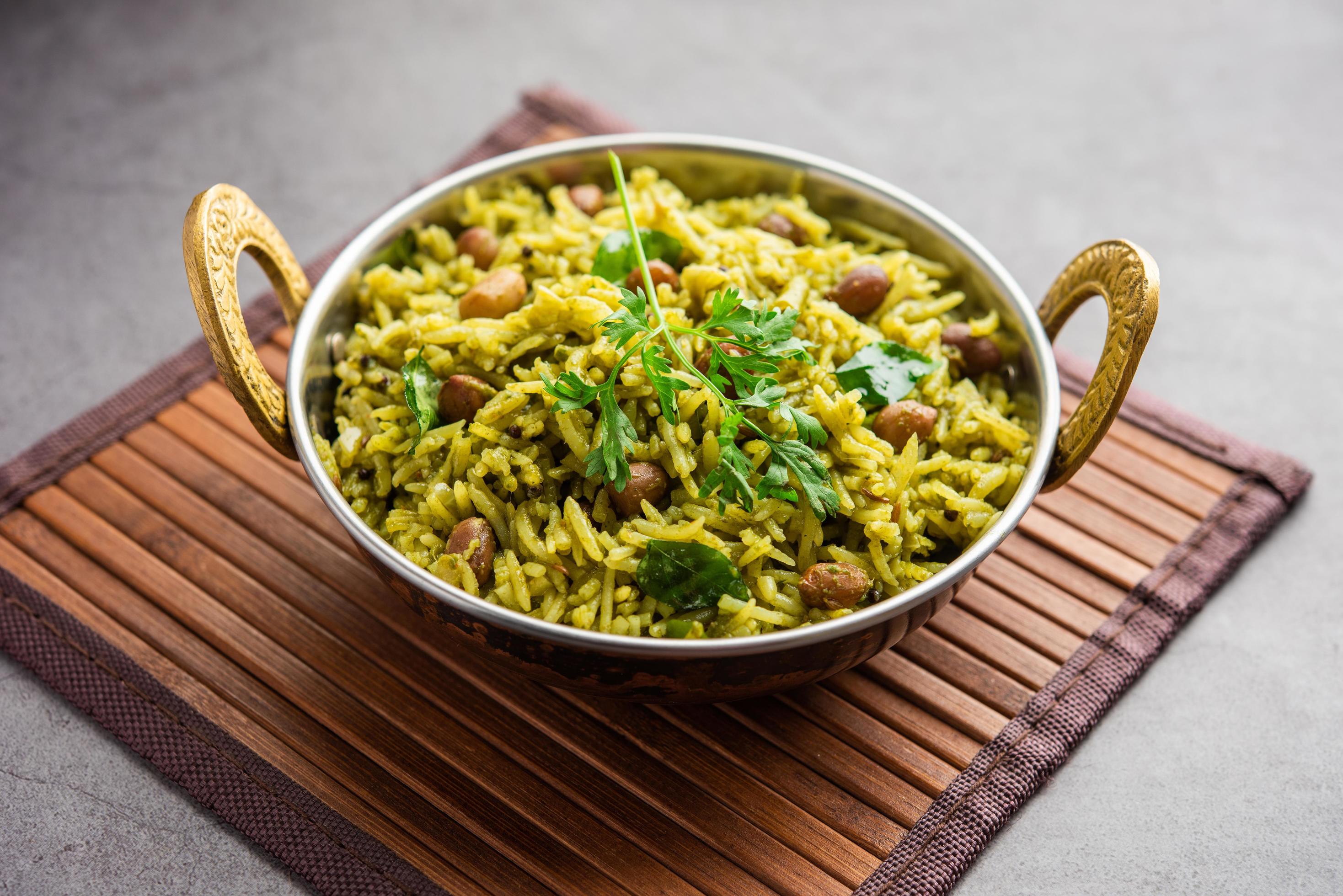 Palak khichdi is a one pot nutritious meal of mung lentils and rice with spinach, Indian food Stock Free