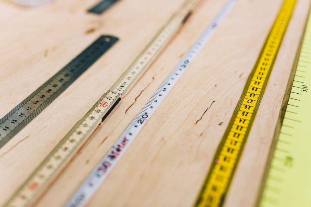 Close-ups of rulers on a wooden table Stock Free