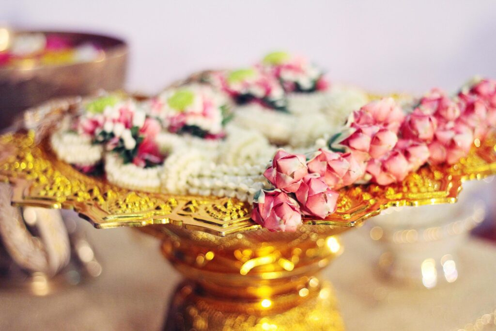 Flower garlands on a gold tray in tradition Thai wedding ceremony day. Jasmine garland. Stock Free