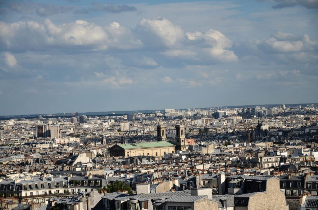 bird’s eye view of the city of Paris, capital of France, during a hot summer day in August 2012 Stock Free