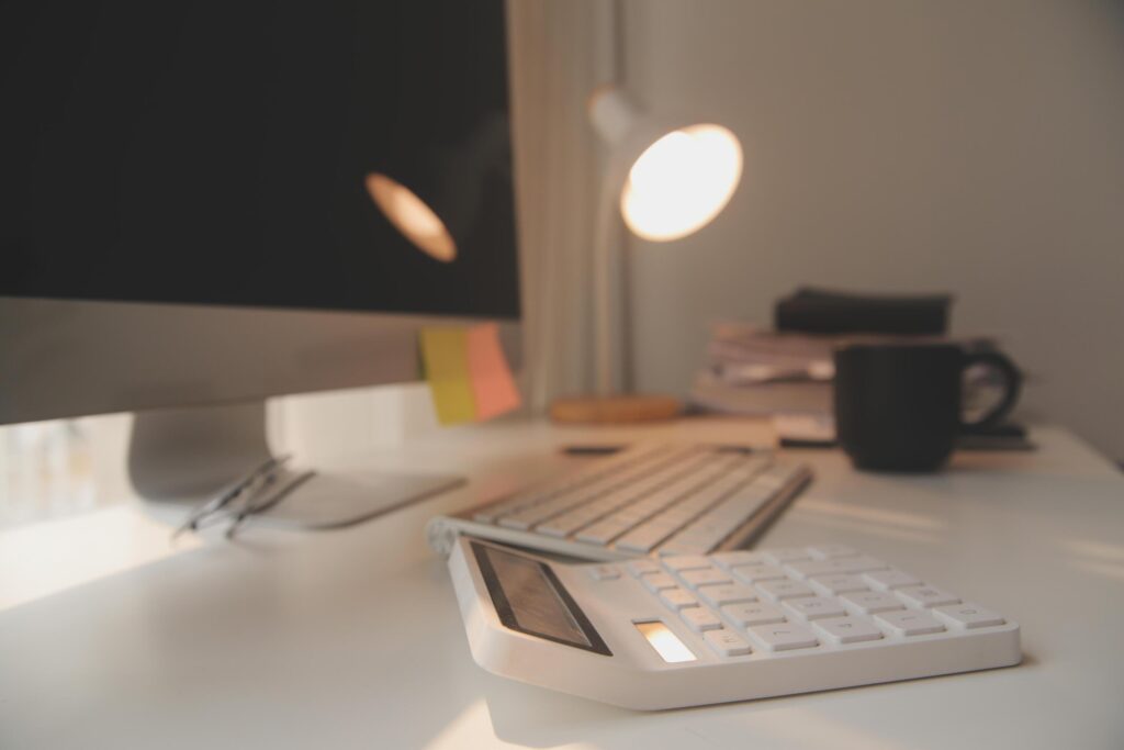 messy office workspace. Messy and cluttered office desk. Messy business office with piles of files and disorganized clutter. Stock Free