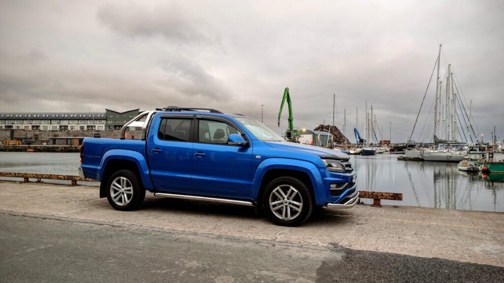 Modern blue off road vehicle parked at Galway docks by the ocean, automotive background, car and transport Stock Free