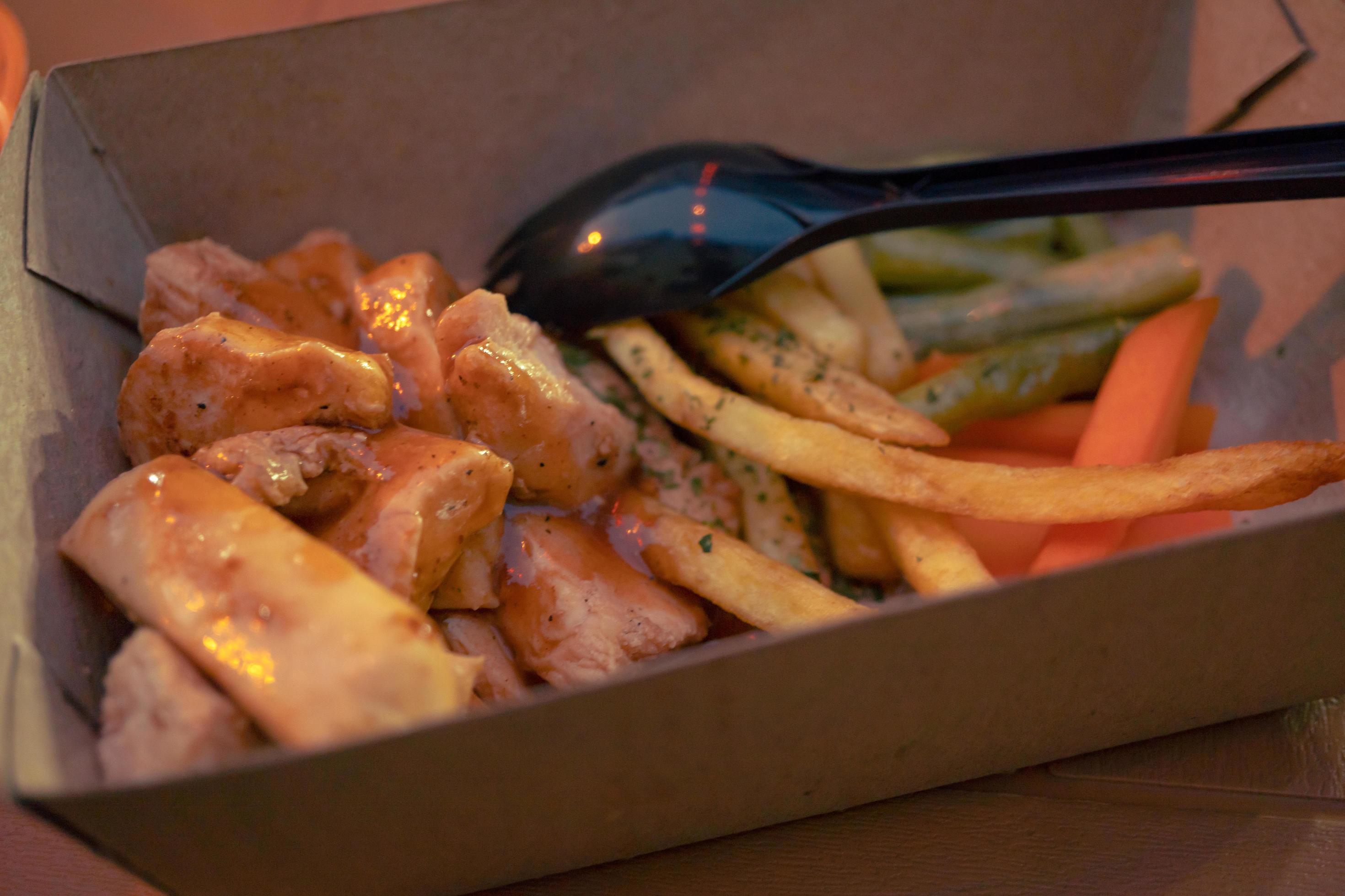 Fried chicken steak with fired fries bean and barbeque black paper sauce. The photo is suitable to use for food background, poster and food content media. Stock Free