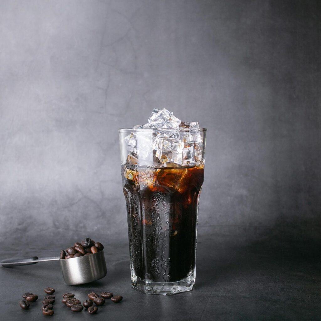 Americano iced coffee, menu coffee and roasted beans, coffee in a square spoon, background Stock Free