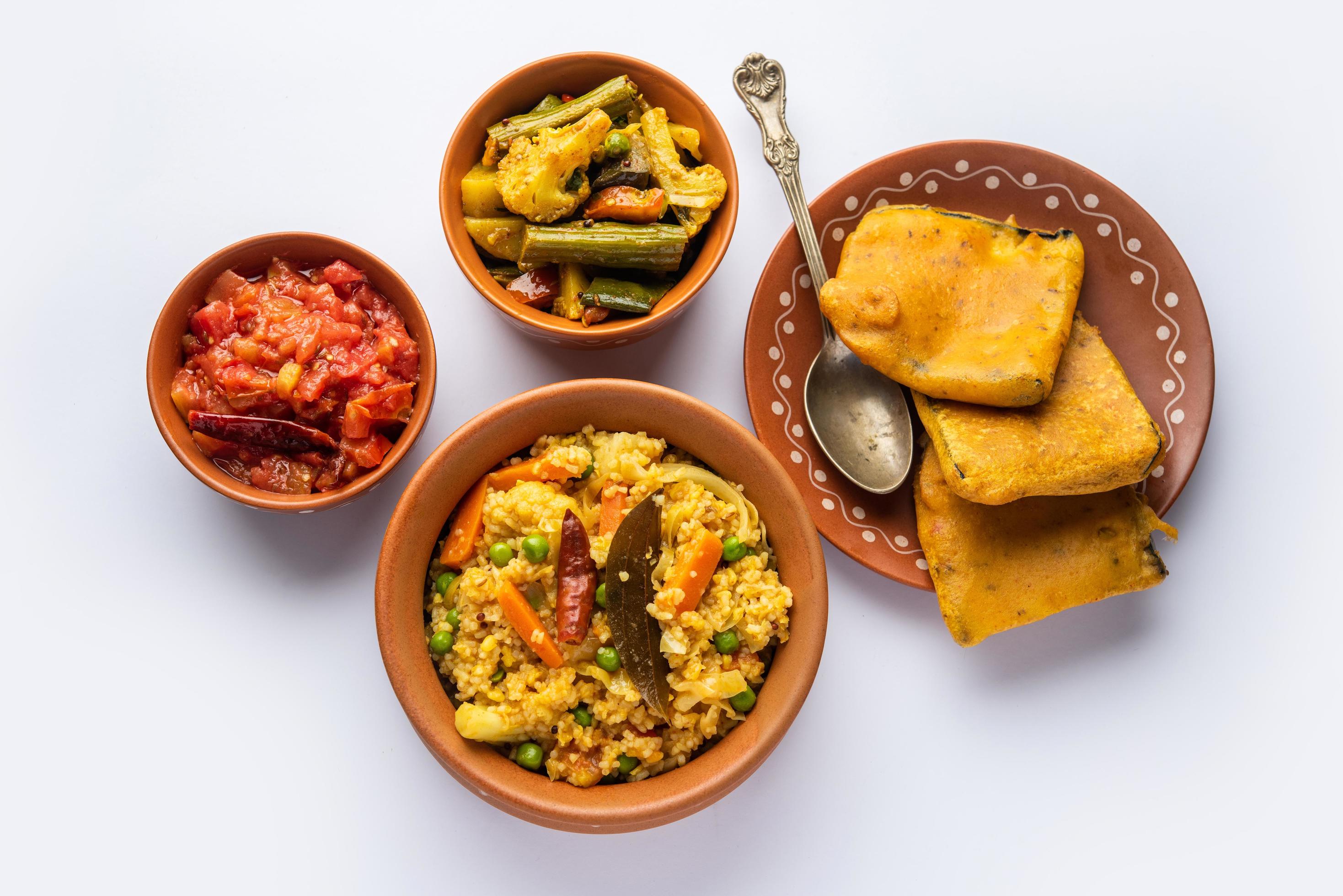 Bengali Bhog food for Indian Hindu Durga Puja or pooja festival. Khichadi, labra, tomato chutney Stock Free