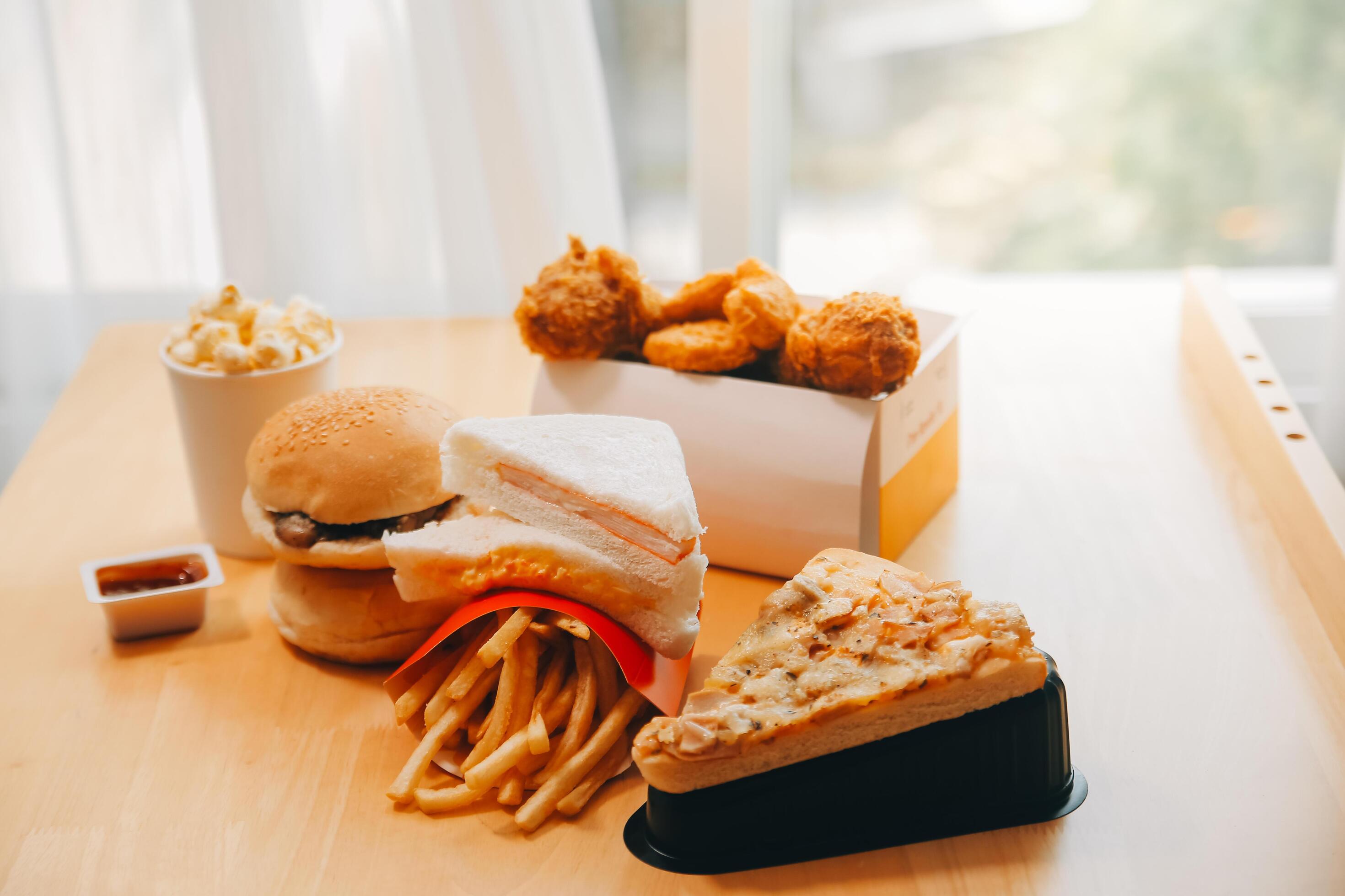 Closeup of home made burgers on wooden background Stock Free