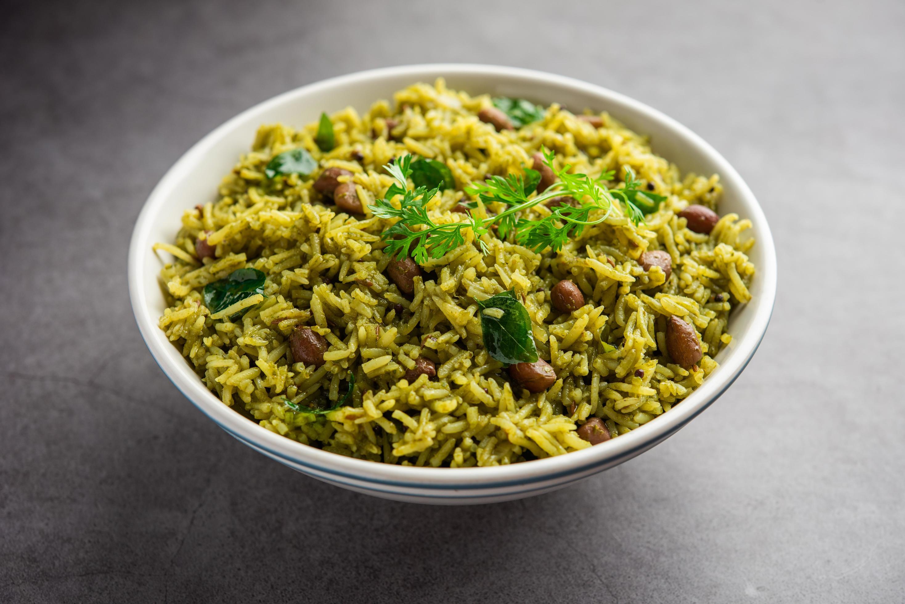 Palak khichdi is a one pot nutritious meal of mung lentils and rice with spinach, Indian food Stock Free