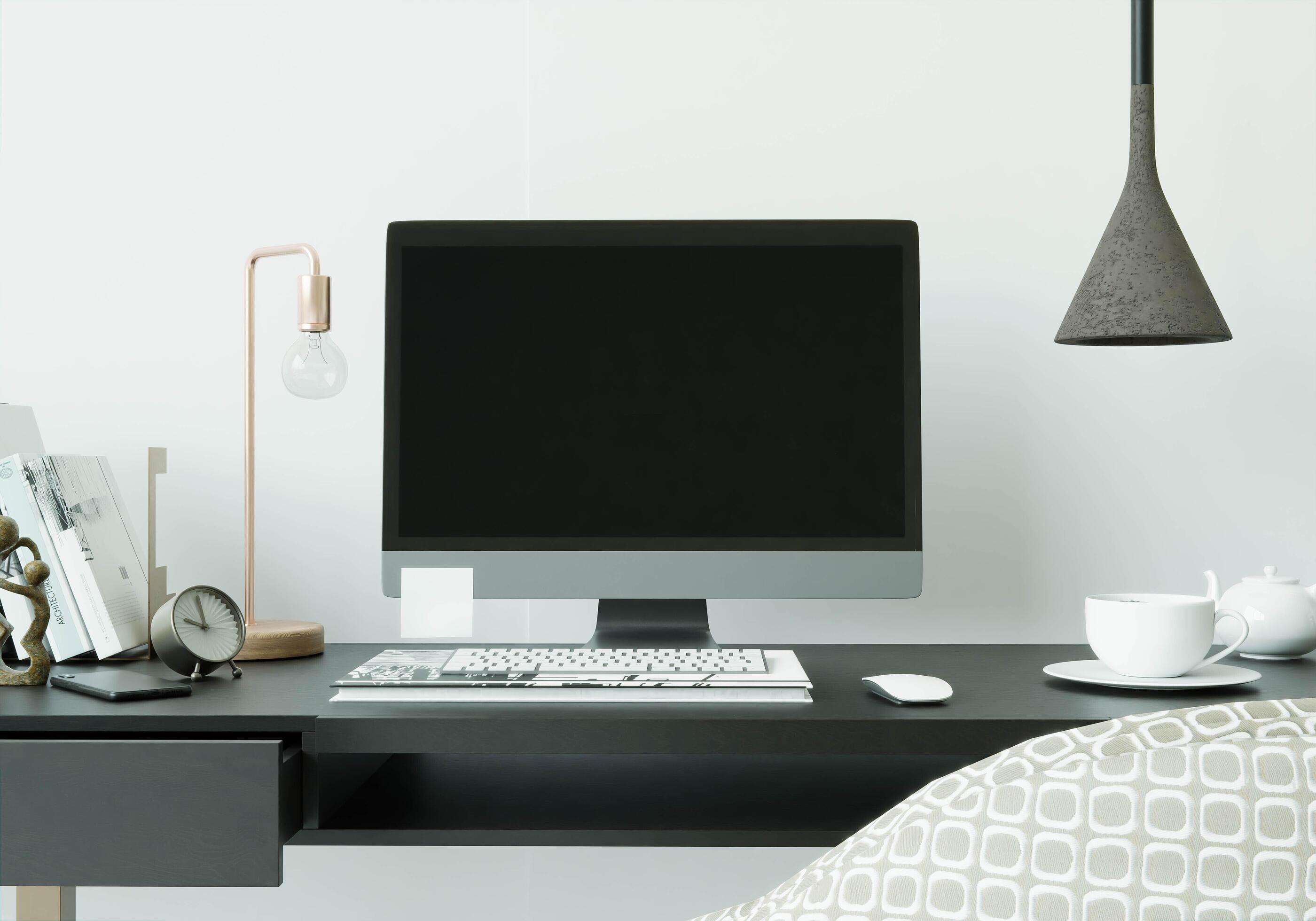 A working room with a computer placed on the table Stock Free