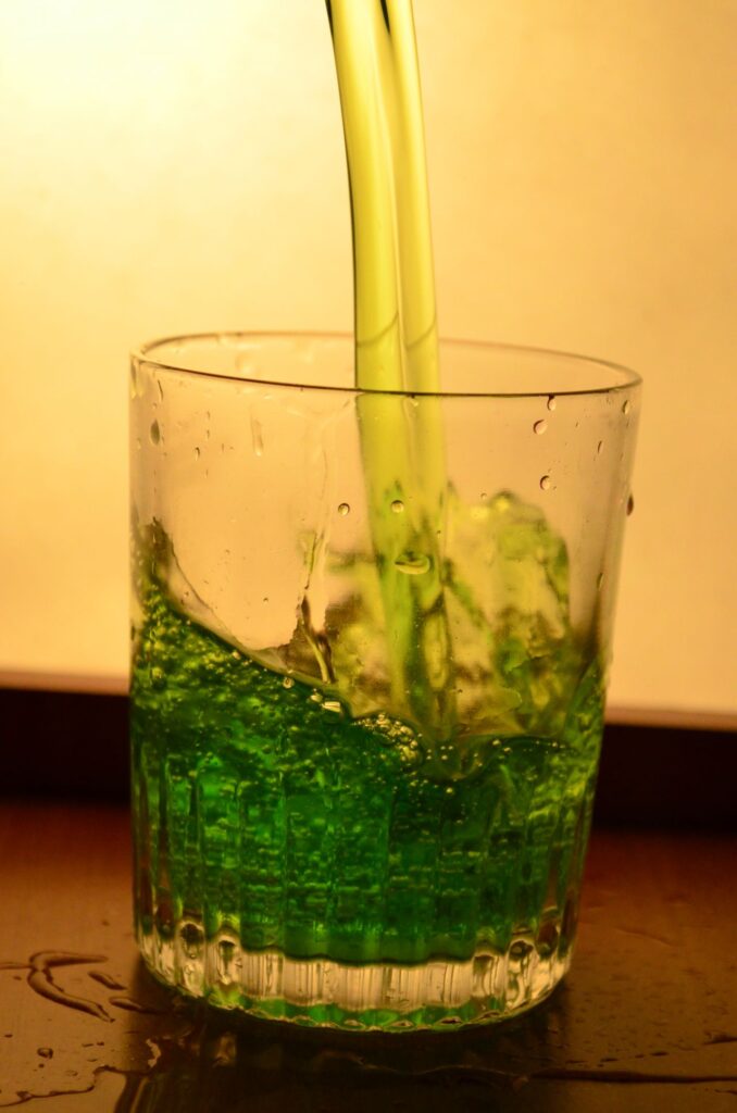 Glass Of Greenish Liquid Stock Free