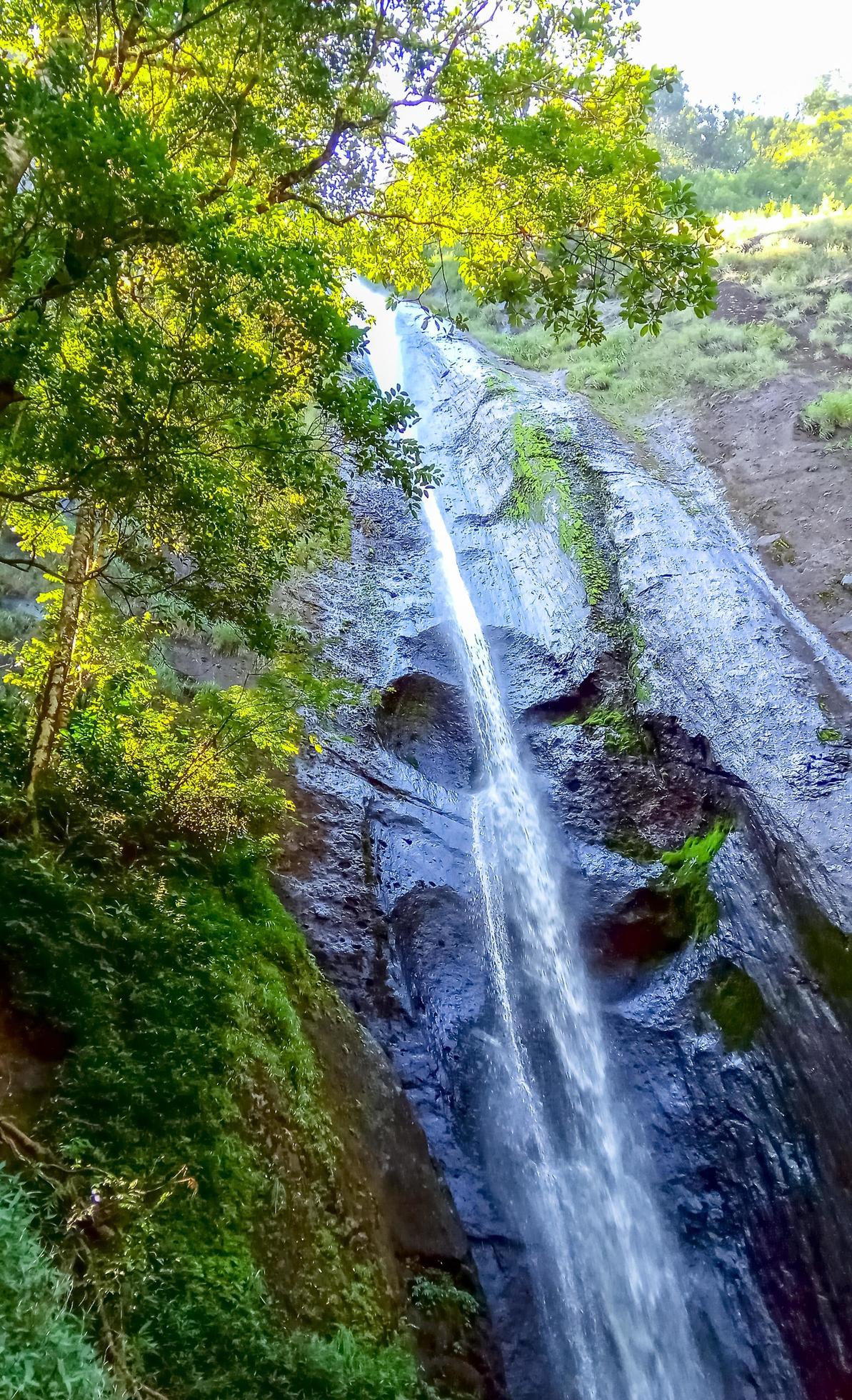 beautiful natural scenery of dolo waterfall seen from below Stock Free