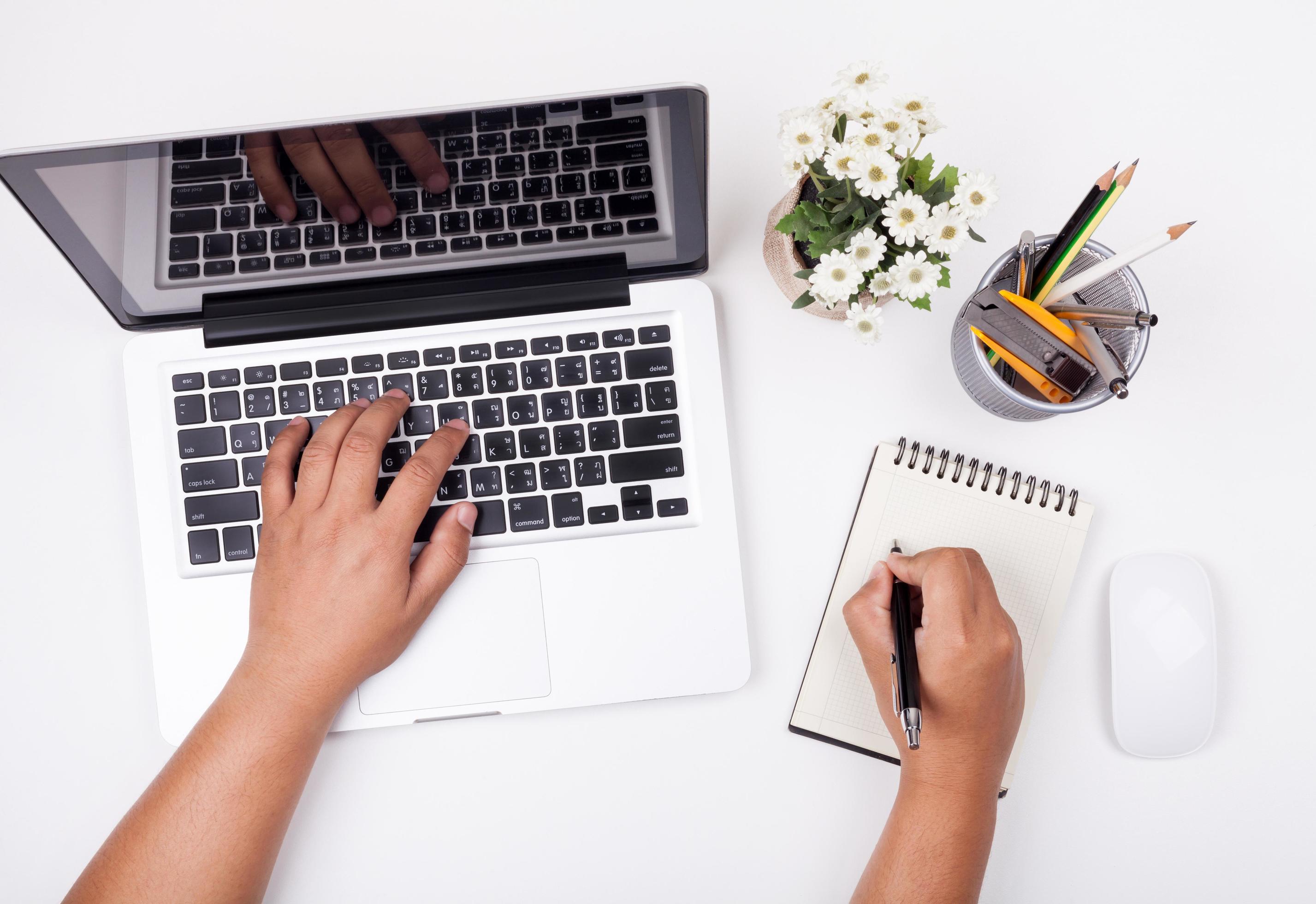 Top view of Businessman working at office desk. Computer, laptop Stock Free