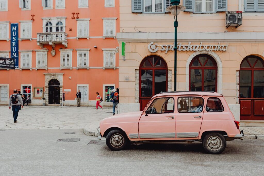 Pink Renault 4 on the street in the city of Rovinj, Croatia Stock Free