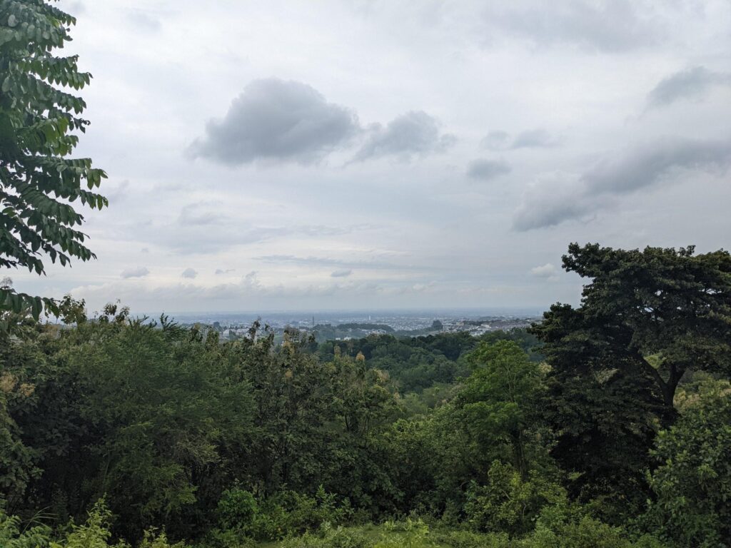 Landscape of hilltop with cloudy vibes when rain season. The photo is suitable to use for environment background, nature poster and nature content media. Stock Free