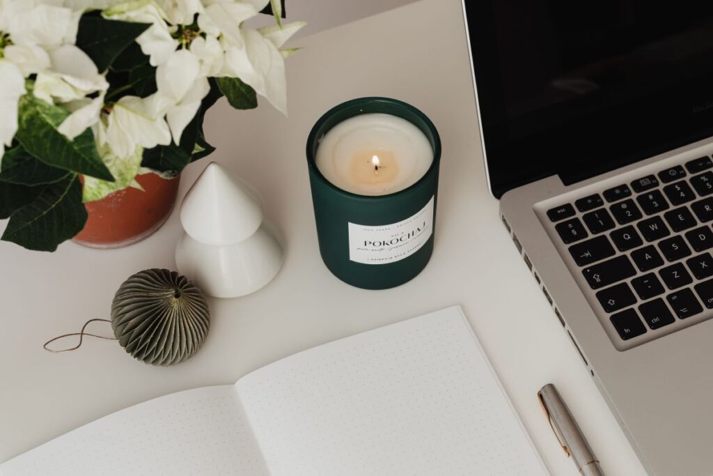 Detail of desk with laptop – supplies – notepad Stock Free