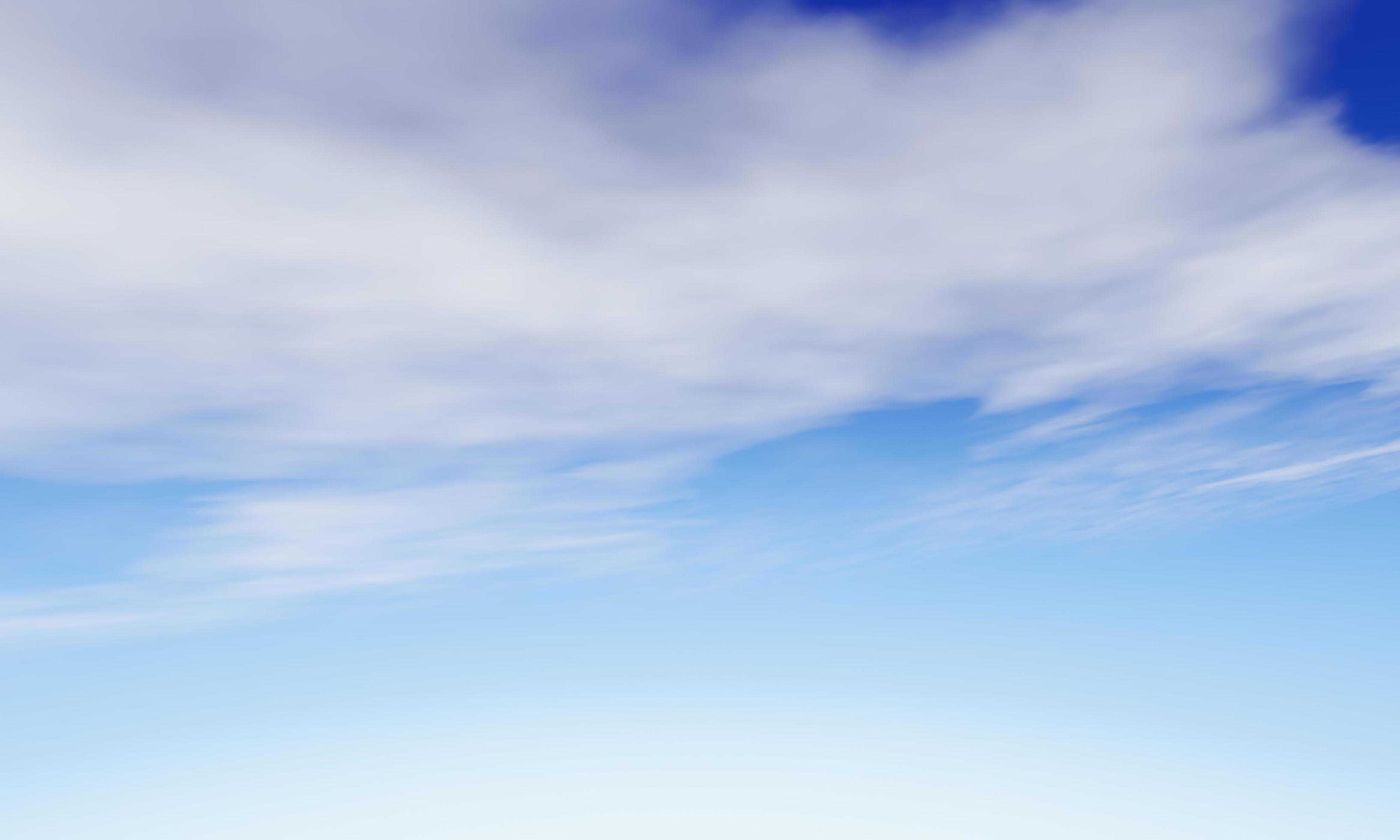 blue sky background with a tiny clouds. Sunshine clouds sky during morning background. Abstract blurred cyan gradient of peaceful nature. Stock Free