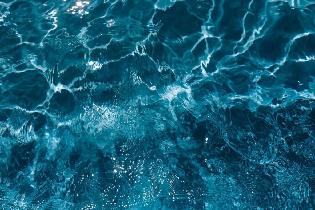 Wavy water surface in a swimming pool Stock Free