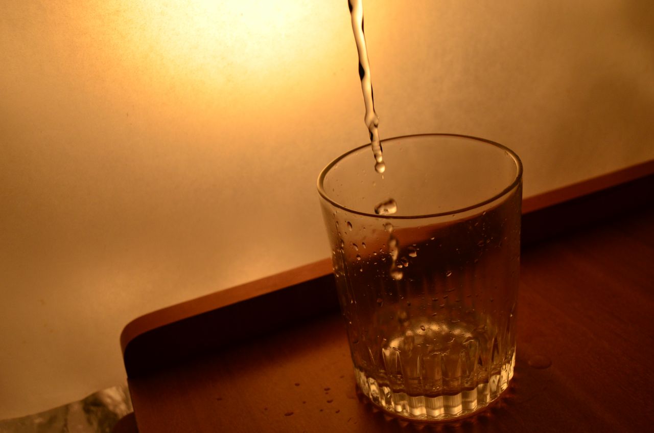 Water Pouring In Glass Stock Free