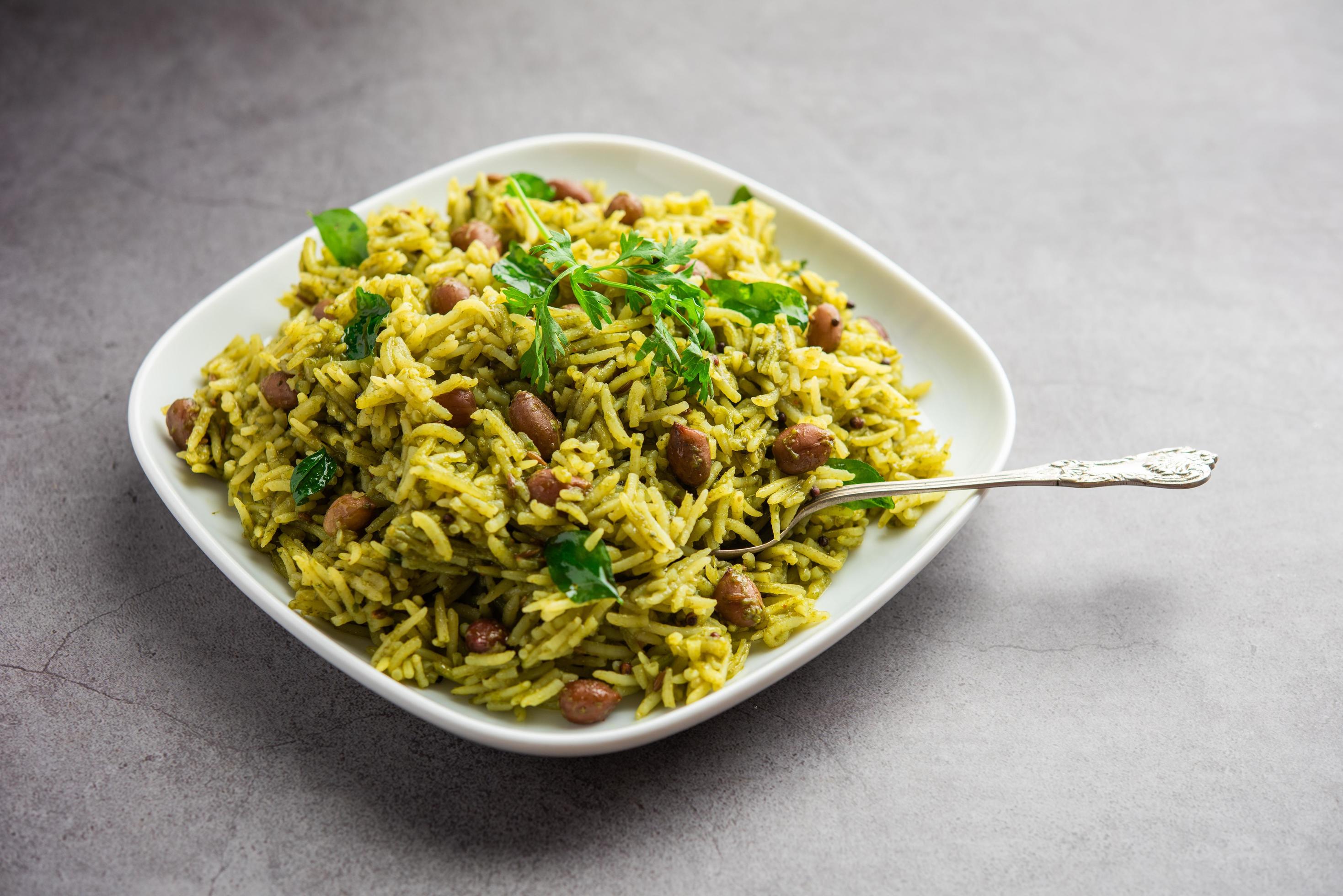 Palak khichdi is a one pot nutritious meal of mung lentils and rice with spinach, Indian food Stock Free