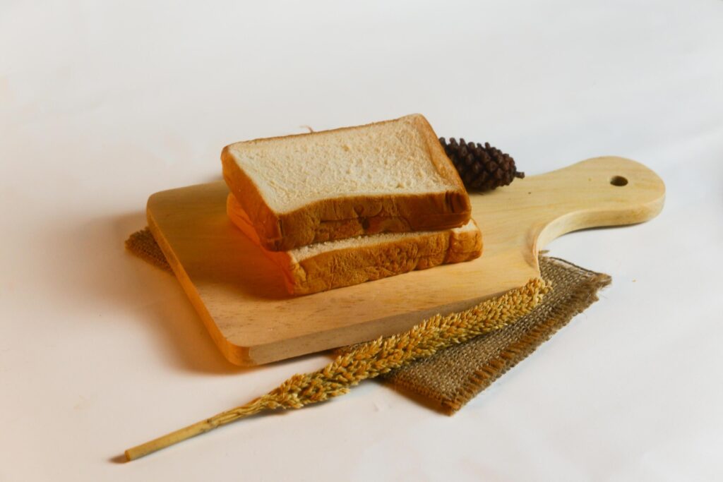 photography of bread with wheat on a white background Stock Free