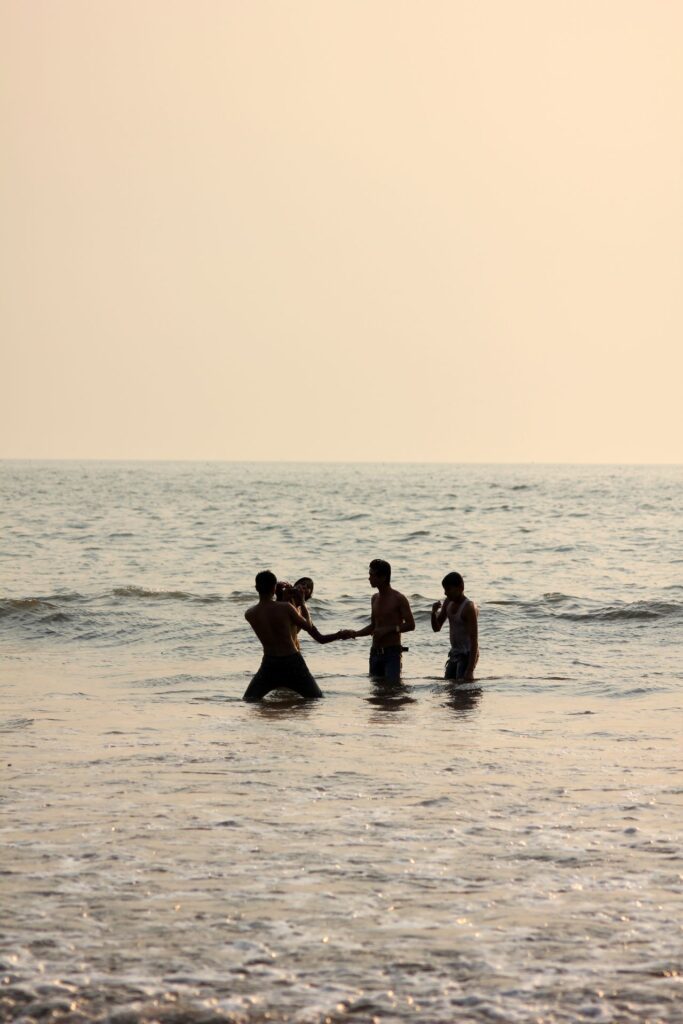 Friends Playing In Sea Beach Stock Free