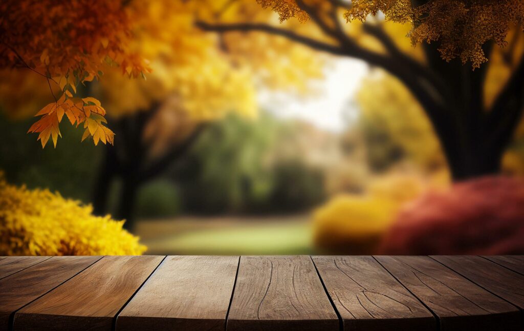 AI generated Abstract empty wooden desk tabletop with copy space over autumn trees blurred background, display for product montage, Generative Ai Stock Free