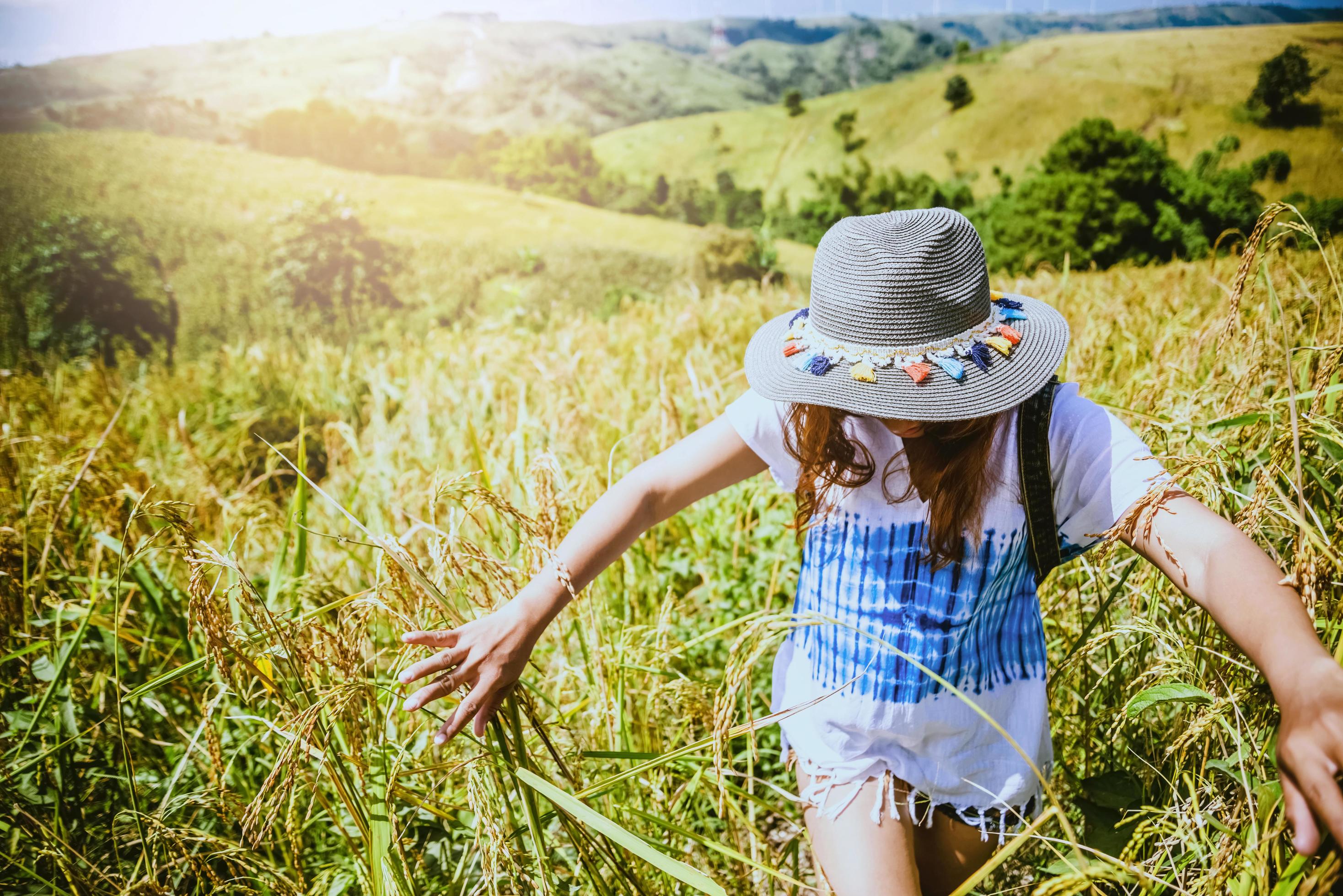 Asian women travel relax in the holiday. Stand natural touch mountain field. Thailand Stock Free